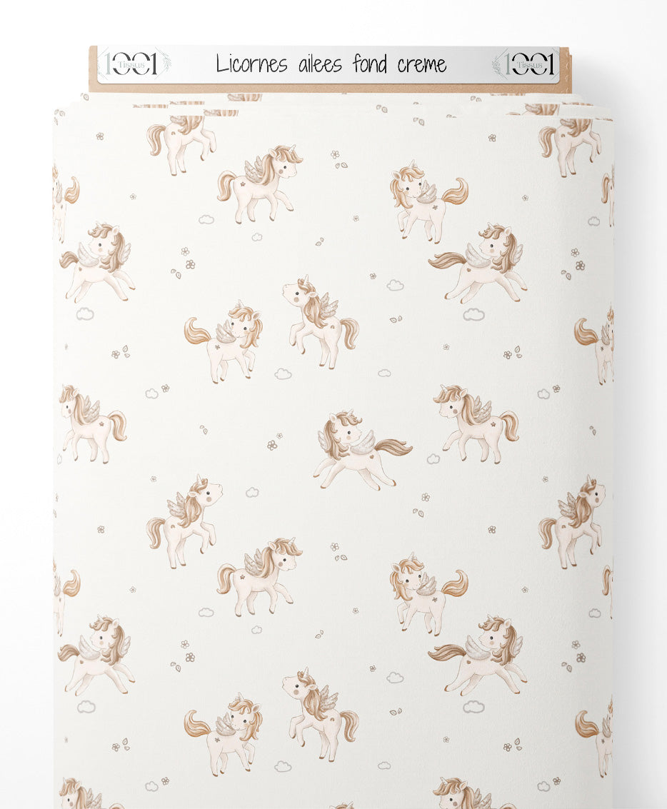 Tissu - Licornes ailées sur fond crème