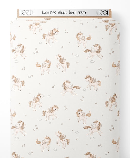 Tissu - Licornes ailées sur fond crème