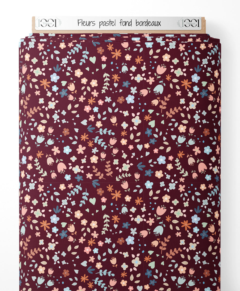 Tissu - Fleurs pastel sur fond bordeaux