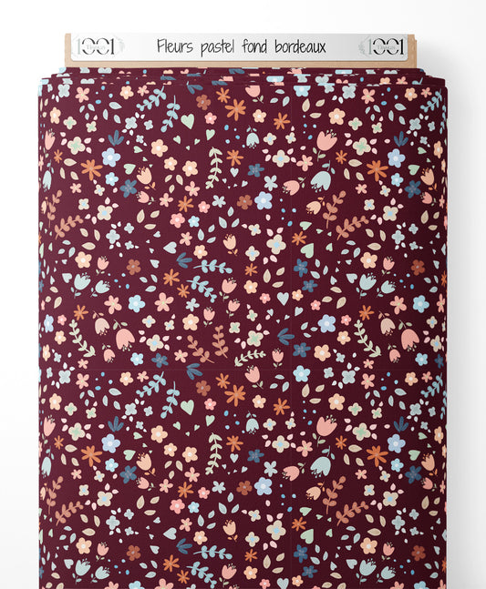 Tissu - Fleurs pastel sur fond bordeaux