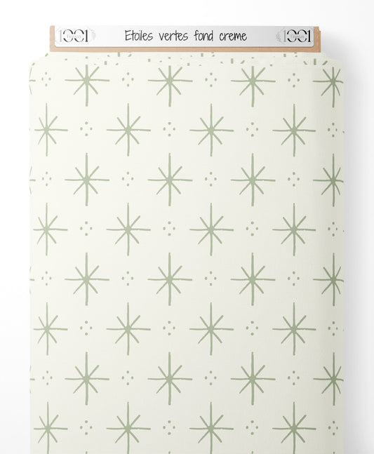 Tissu - Étoiles vertes sur fond crème