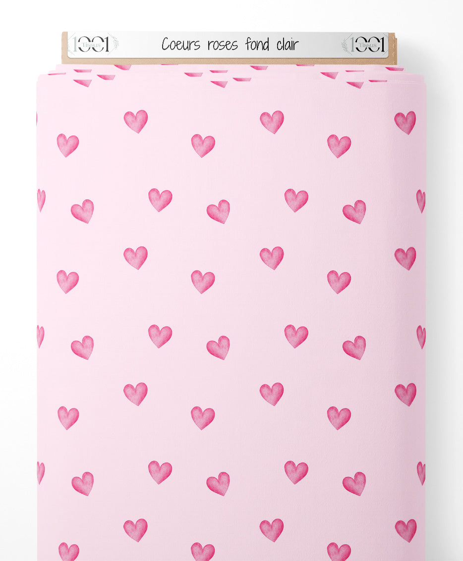 Tissu - Cœurs roses sur fond clair