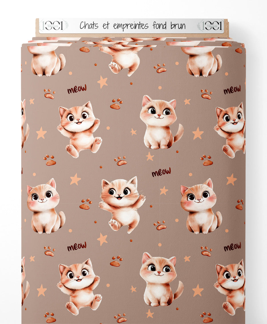 Tissu - Chats et empreintes sur fond brun