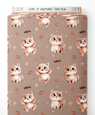 Tissu - Chats et empreintes sur fond brun