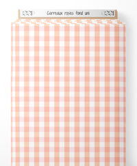 Tissu - Carreaux roses sur fond uni