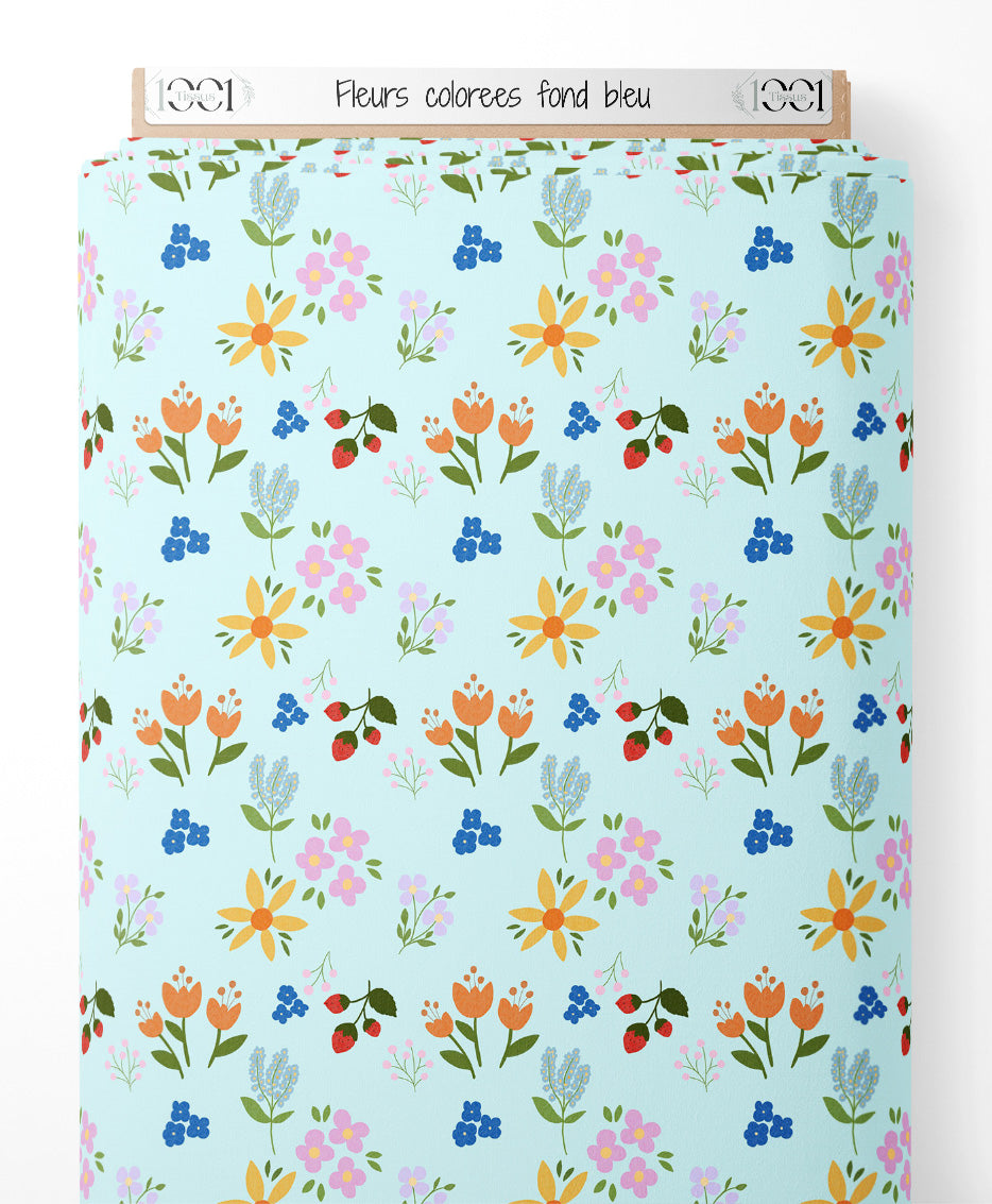Tissu - Fleurs colorées sur fond bleu