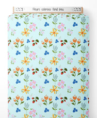 Tissu - Fleurs colorées sur fond bleu
