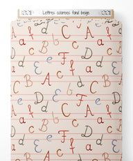 Tissu - Lettres colorées sur fond beige