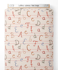 Tissu - Lettres colorées sur fond beige