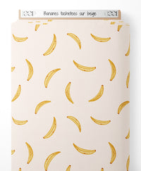 Tissu - Bananes tachetées sur beige