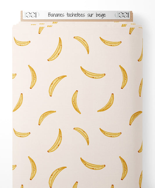 Tissu - Bananes tachetées sur beige