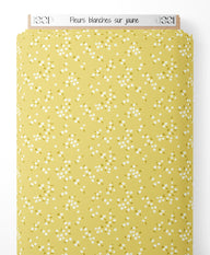 Tissu - Fleurs blanches sur jaune