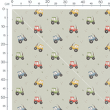 Tissu - Tracteurs multicolores sur fond