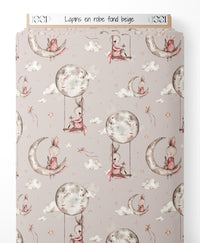 Tissu - Lapins en robe sur fond beige
