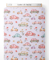 Tissu - Scooters vifs sur fond lilas