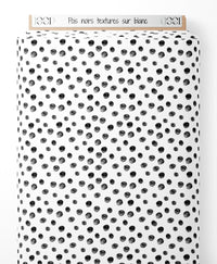 Tissu - Pois noirs texturés sur blanc