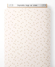 Tissu - Empreintes beige sur crème