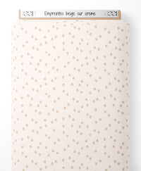 Tissu - Empreintes beige sur crème