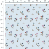 Tissu - Fleurs pastel sur bleu clair