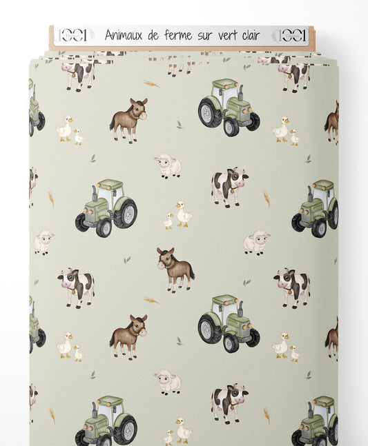 Tissu - Animaux de ferme sur vert clair