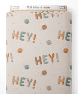 Tissu - Motif lettres et visages