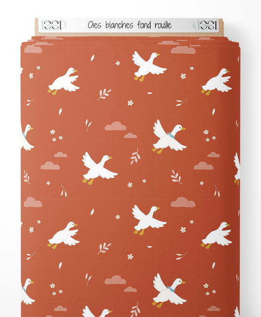 Tissu - Oies blanches sur fond rouille