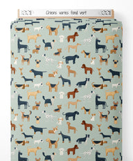 Tissu - Chiens variés sur fond vert