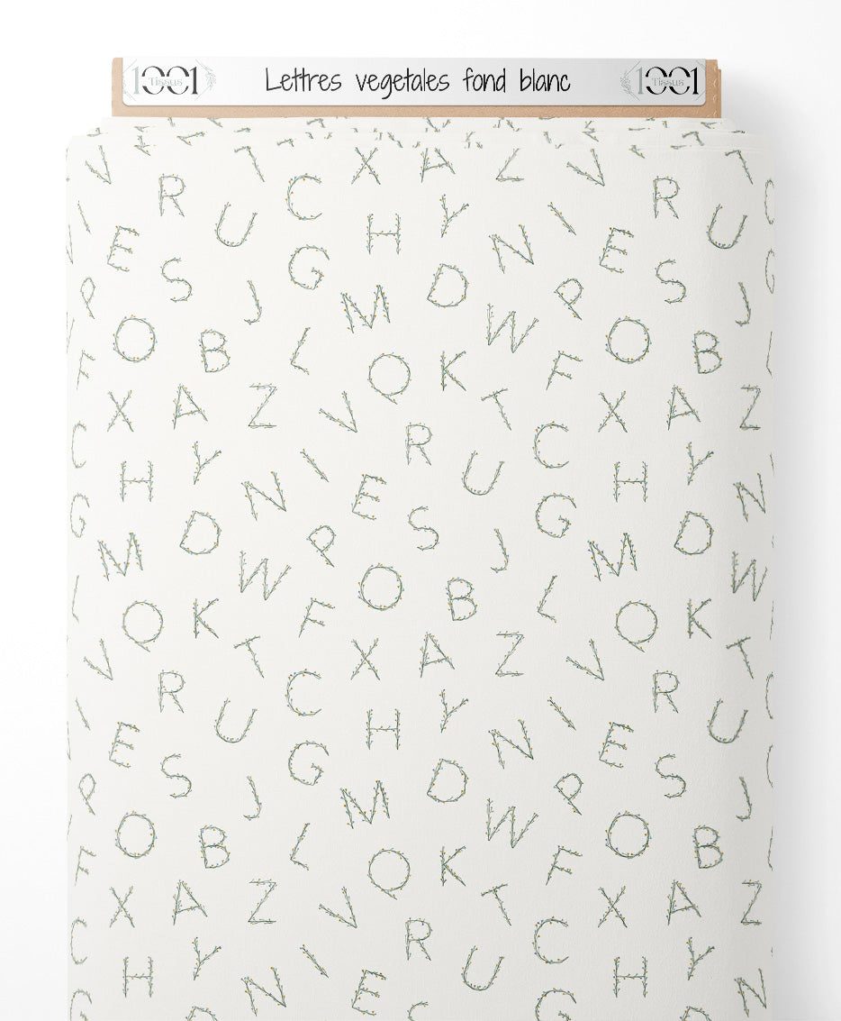 Tissu - Lettres végétales sur fond blanc