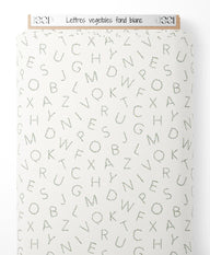 Tissu - Lettres végétales sur fond blanc