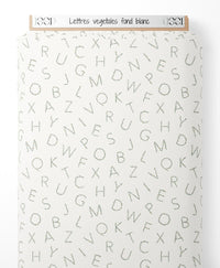 Tissu - Lettres végétales sur fond blanc