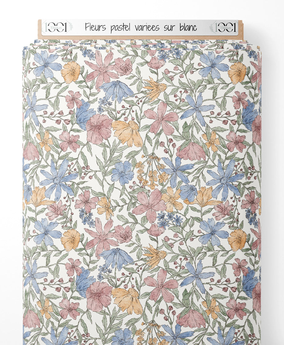 Tissu - Fleurs pastel variées sur blanc