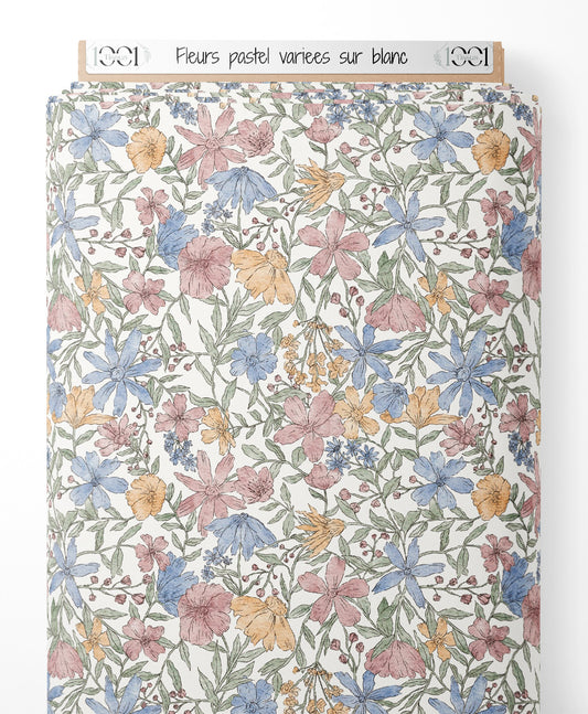 Tissu - Fleurs pastel variées sur blanc