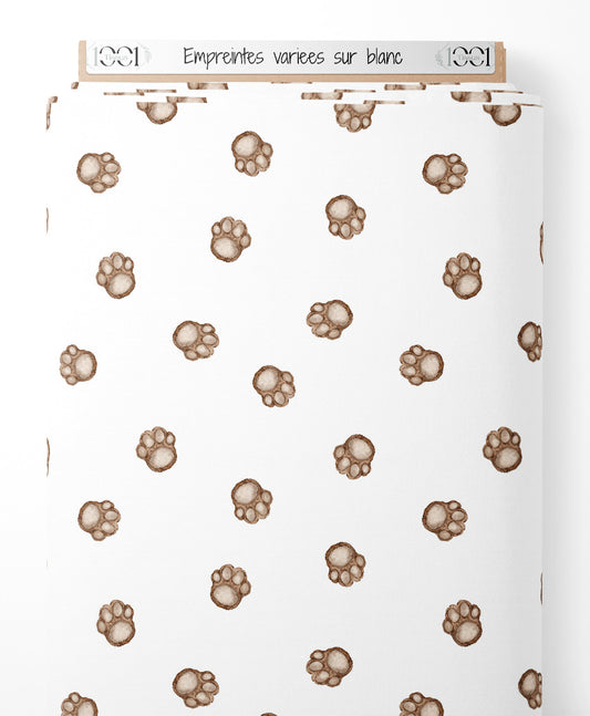 Tissu - Empreintes variées sur blanc