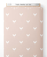 Tissu - Feuilles blanches sur rose