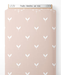 Tissu - Feuilles blanches sur rose