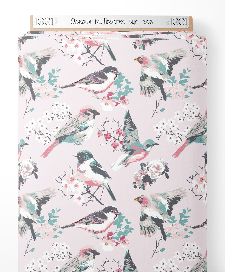 Tissu - Oiseaux multicolores sur rose