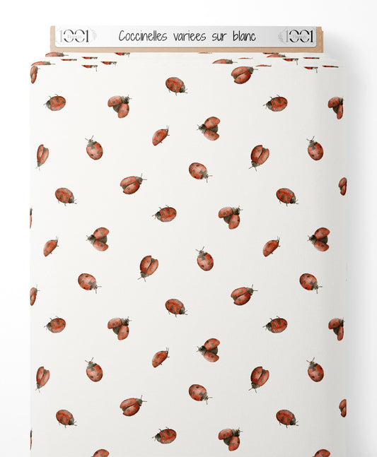Tissu - Coccinelles variées sur blanc