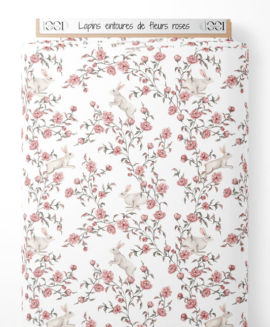 Tissu - Lapins entourés de fleurs roses