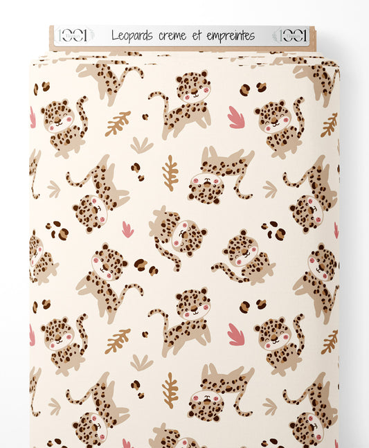 Tissu - Léopards crème et empreintes