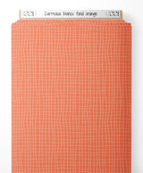 Tissu - Carreaux blancs sur fond orange