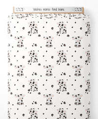 Tissu - Vaches noires sur fond blanc