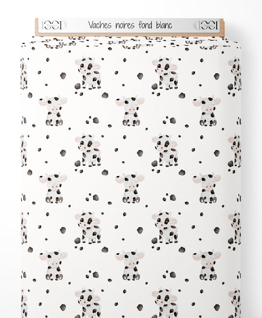 Tissu - Vaches noires sur fond blanc