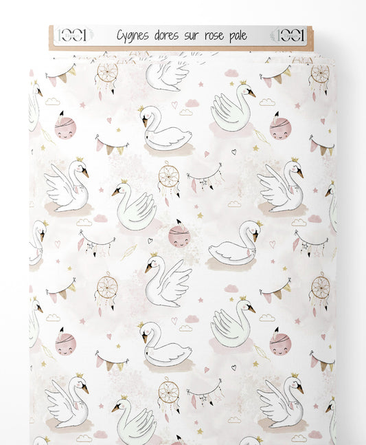 Tissu - Cygnes dorés sur rose pâle