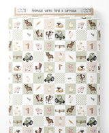 Tissu - Animaux variés sur fond à carreaux