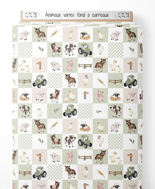Tissu - Animaux variés sur fond à carreaux