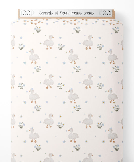 Tissu - Canards et fleurs bleues crème