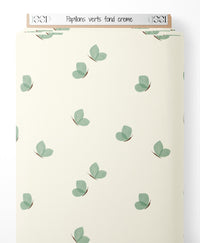 Tissu - Papillons verts sur fond crème