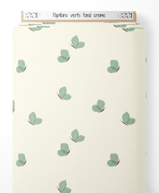 Tissu - Papillons verts sur fond crème