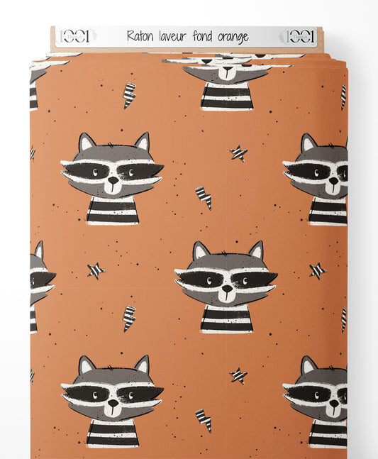 Tissu - Raton laveur sur fond orange