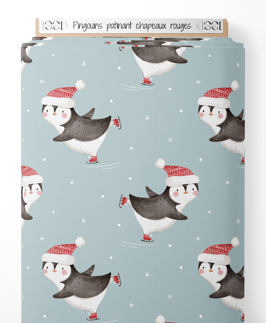 Tissu - Pingouins patinant chapeaux rouges